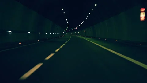 Point of view car driving tunnel at night Vídeo Stock 148121579