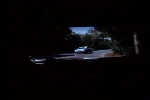 Point of view from car speeding on country road Stock Footage