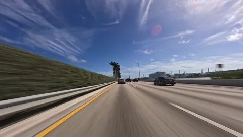 Point of view of car view driving plate on Miami highway during daytime Stock Footage 276654250