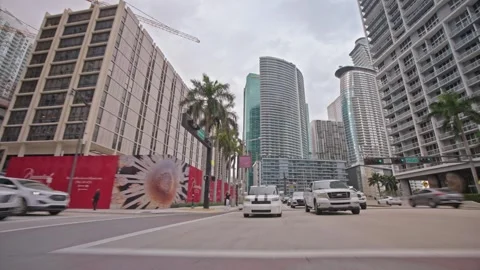 Point of view car view driving plate on Miami Brickell city street architecture Video stock 276654849