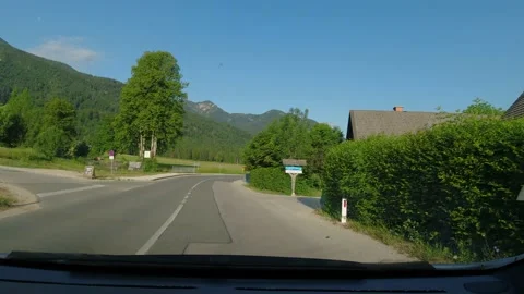 Point of view from a car while driving on a paved countryside road Stock Footage 220793284