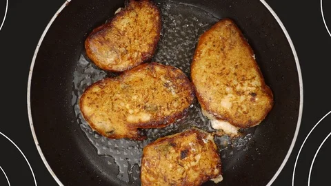 Point of view of the chef, which fries pancakes in a hot frying pan. Stock Footage 95470337