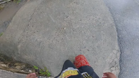 Point of view of a child playing in the rain Stock Footage 325645746