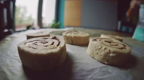 Point of view: cinnamon rolls being put into the hot oven. Slow Motion. 스톡 동영상 55313255