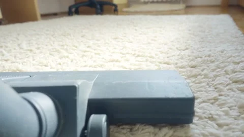 Point of view. Cleaning the room with a vacuum cleaner. Close-up of the nozzle. 库存影片 221234896