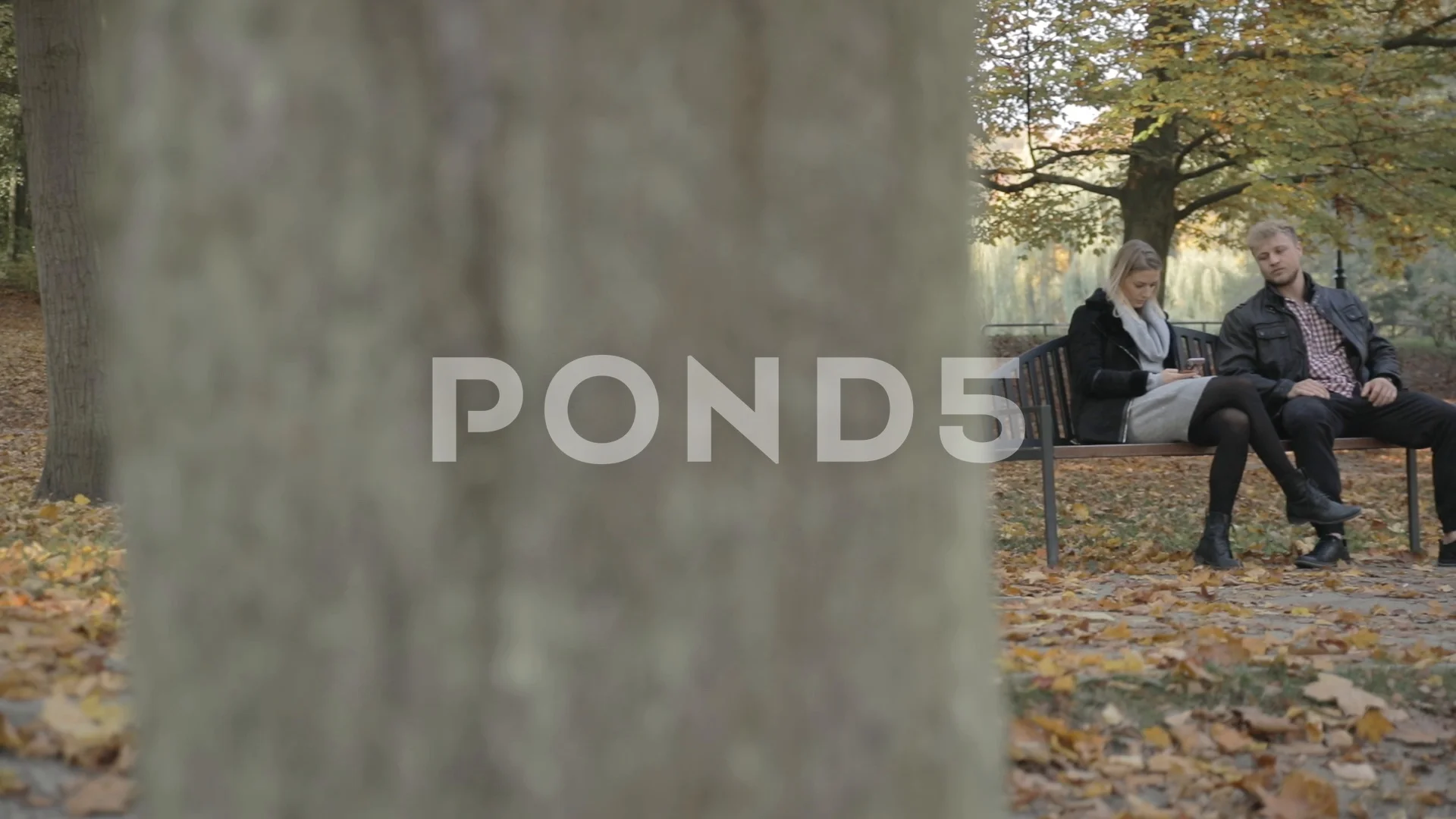 Point of view of a creepy voyeur getting caught spying on a couple in a