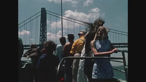 Point of view, crowd of people onboard approaching the George Washington Bridge Stock Footage 82548038