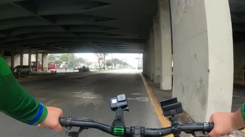 Point of view of a cyclist riding his bicycle crossing a bridge below  Vidéo 144273446