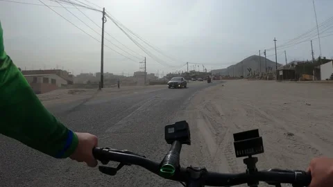 Point of view of a cyclist riding his bicycle going up Cieneguilla Stockbeeldmateriaal 144274709