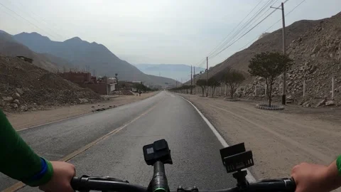 Point of view of a cyclist riding his bike down Cieneguilla avenue Vidéo 144278055