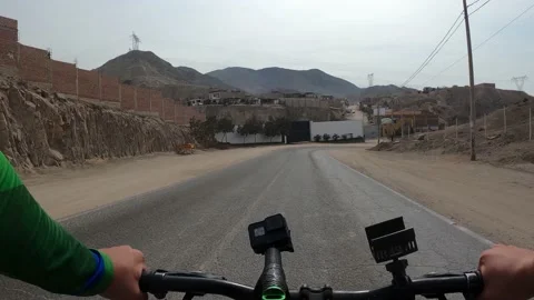 Point of view of a cyclist riding his bike down Cieneguilla avenue Vidéo 144278065