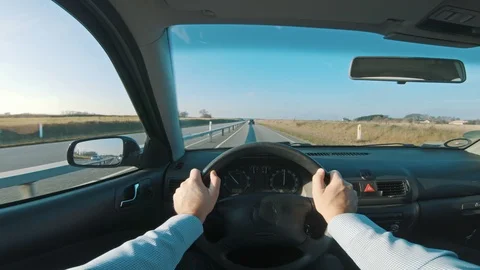 Point of view of driver going fast on the freeway Stock Footage 98681372