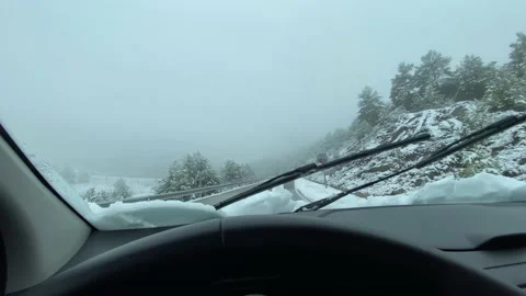 Point of view driver on a snowy day highway asphalt danger Stock Footage 172519944