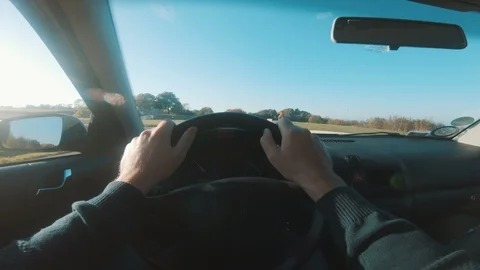 Point of view from drivers perspective while driving on a road trip Stock Footage 98080477
