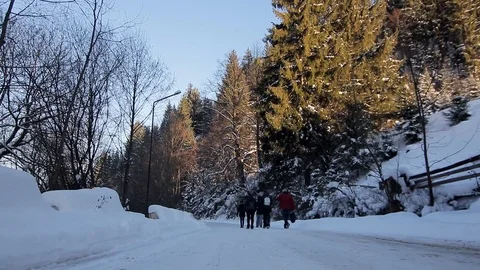 Point of view from drive's side, vehicle driving on snowy mountain road. Stock Footage 126246013