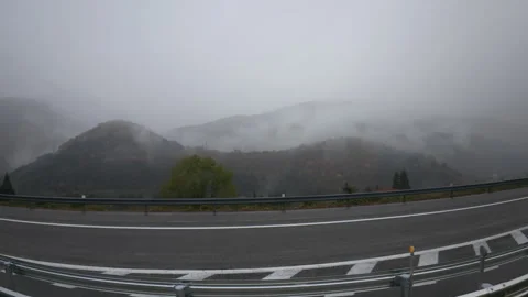Point of view driving along a curved mountain highway  in Japan Видео 329619905