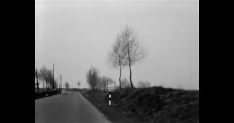 Point of view driving along a rural country road in Hungary in the 1970s, shot Stock Footage 341395742