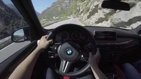 Point of view driving a BMW X5M in France Stock Footage 75325387