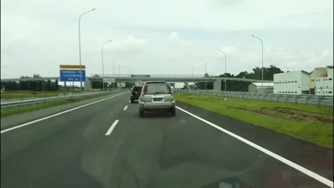 Point of view driving in car On Toll Road in the afternoon Video stock 170836035
