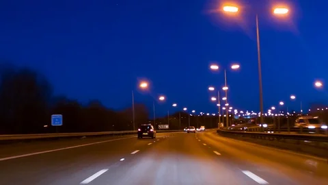 Point of view driving car at twilight Stock Footage 104168414