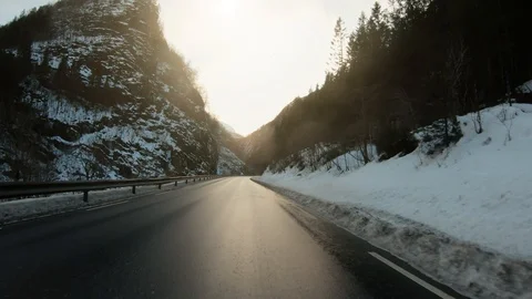 Point of view driving car on winter snowy road Stock Footage 103045662