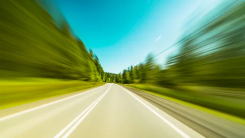 Point of View Driving on the Highway Outside the City. A Car Moves Fast Along Stock Footage 259283395