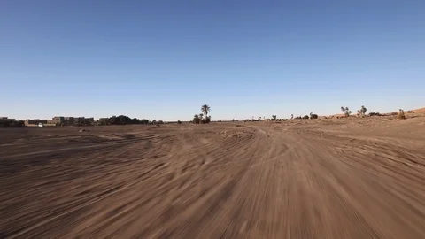 Point of View driving in sand dunes in the desert Stock Footage 85616571