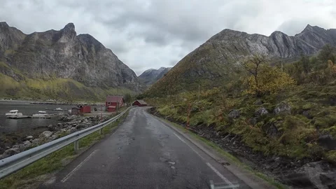 Point of view driving on a scenic road through a Norwegian fjord on a cloud.. Stock Footage 325220008