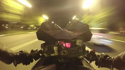 Point of view driving a Suzuki Gsxr motorcycle at night Stock Footage