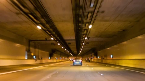 Point of view driving through a tunnel at night Video stock 104167006
