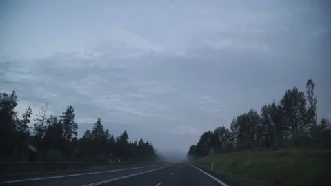 Point of view driving,dashboard camera,on a dark rainy foggy mountain road with Stock Footage 78208494
