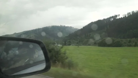 Point of view driving,dashboard camera,on a dark rainy foggy mountain road with Stock Footage 78209604