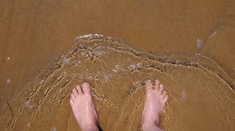Point of view of feet in sea small waves. Stock Footage 51380962