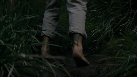 Point of view feet walking through a track Stock Footage 169294193