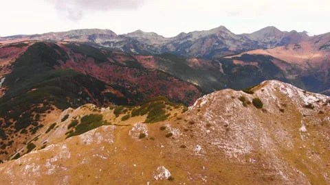 Point of view flight with hiker taking pictures in the Carpathian Mountains Stock Footage 130853596