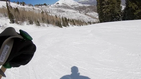 Point of view, go pro of skier making dynamic turns at a Utah ski resort. Stock Footage 99471304