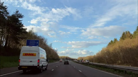 Point of view going down motorway or highway with the traffic moving smoothly 库存影片 239826260