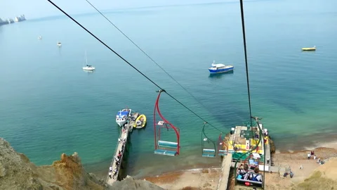 Point of view going down in The Needles Chairlift (Isle of Wight) Stock Footage 244852134