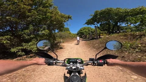 Point of view group of friends riding motorbikes on a dirt trail Stock Footage 281066168