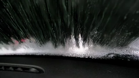 Point of view from inside an automobile going through an automatic car wash Stock-Footage 340230675