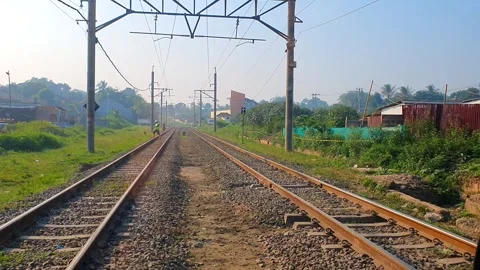 Point of view from inside a car while crossing a railroad track. 스톡 동영상 281497339