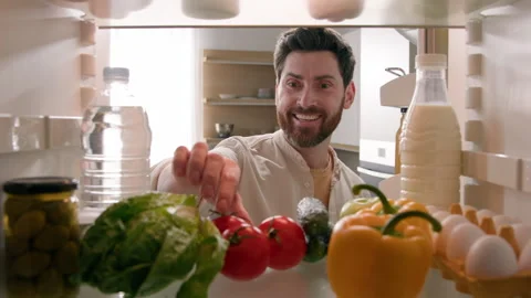 Point of view from inside refrigerator POV Caucasian man householder homeowner Stock Footage 267092122