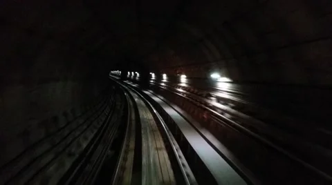 Point of View inside a subway train going through corners inside a tunnel Stock Footage 62072610