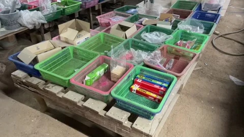 Point of view of items in baskets for sale at old local store, Thailand Stock Footage 255829330