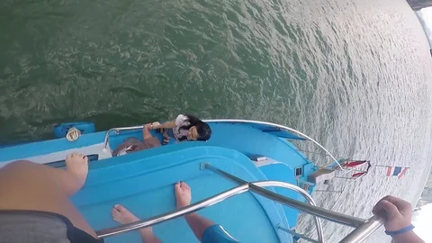 Point of View: Jumping from Boat in to water. Stock Footage 98252154