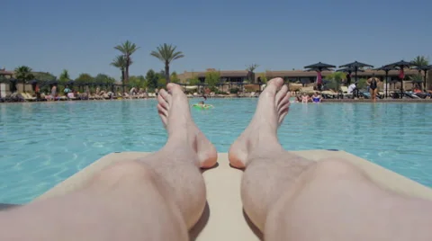 Point of view legs on holiday by pool Video stock 49703560