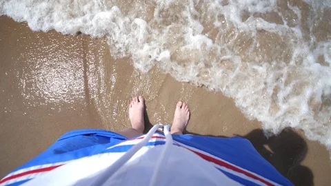 Point of view Man Beach. Legs Ocean Sandy shore Waves Slow motion Stock Footage 128523201