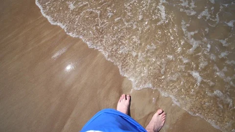 Point of view Man Beach. Legs Ocean Sandy shore Waves Slow motion Stock Footage 128523493