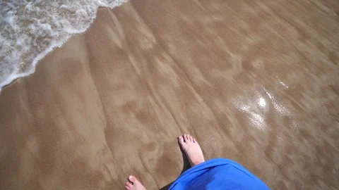 Point of view Man Beach. Legs Ocean Sandy shore Waves Slow motion Stock Footage 128523688