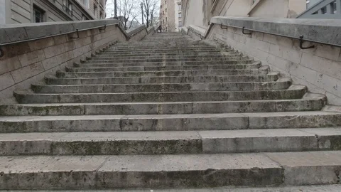 Point of view of man climbing stairs in Paris Stock Footage 126644468